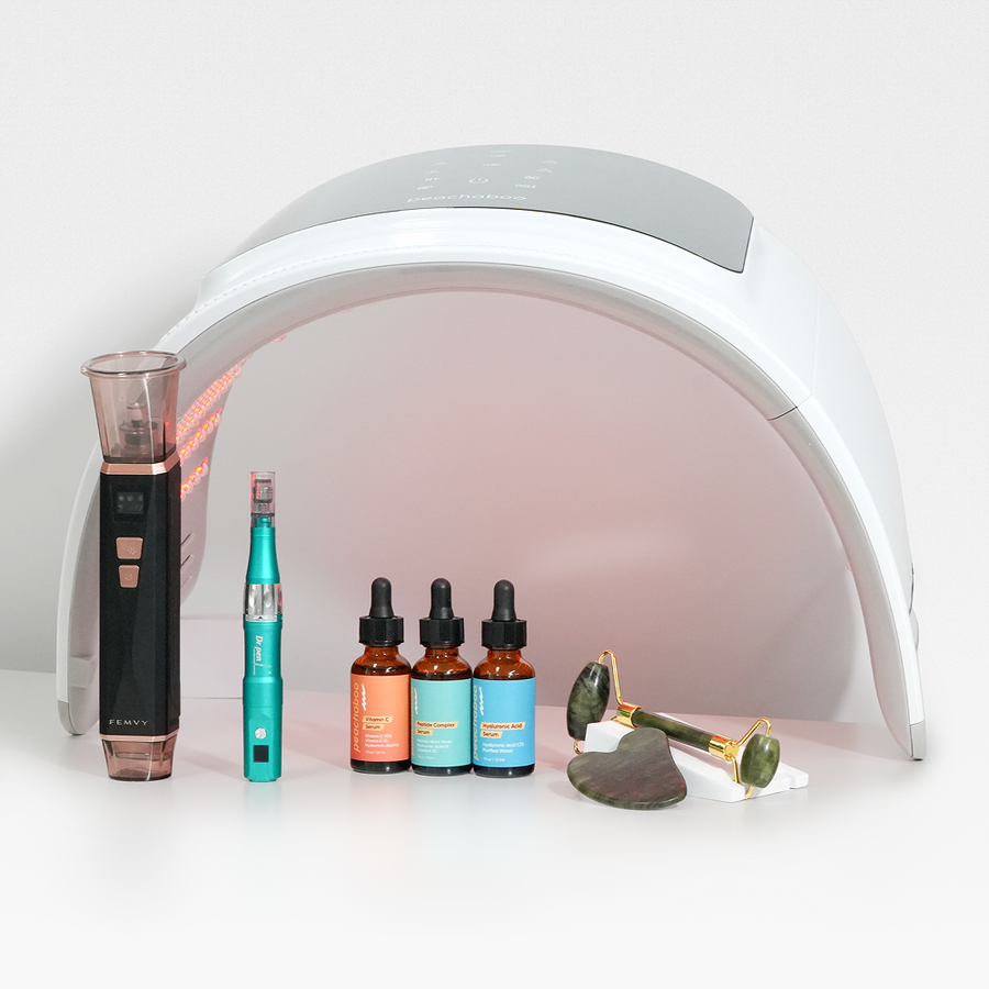 Inside a white box are a therapy pod, bottle of skin serums and Guasha, all included in the Best Sellers Pro Kit.