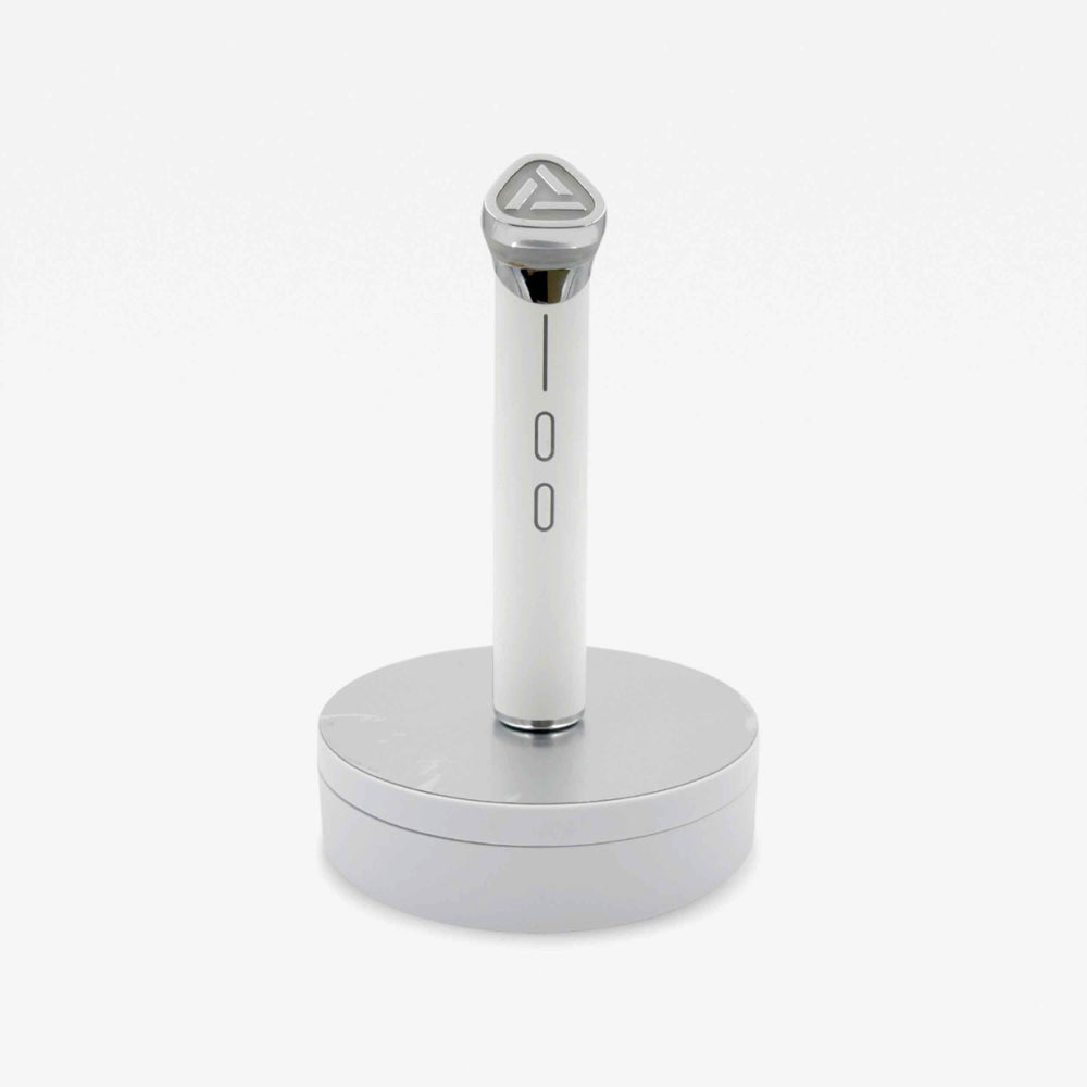 A stunning white and silver wand on a stand, merging style and functionality, perfect for a lavish performance.