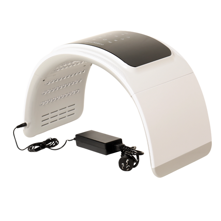 A white headlamp featuring a power cord, part of the Peachaboo LED Light Therapy Pod for enhanced therapeutic benefits.