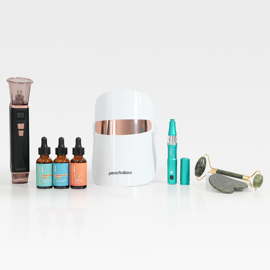 An assortment of facial serum bottles from the Platinum Anti-Ageing Bundle, showcasing their unique packaging and branding.