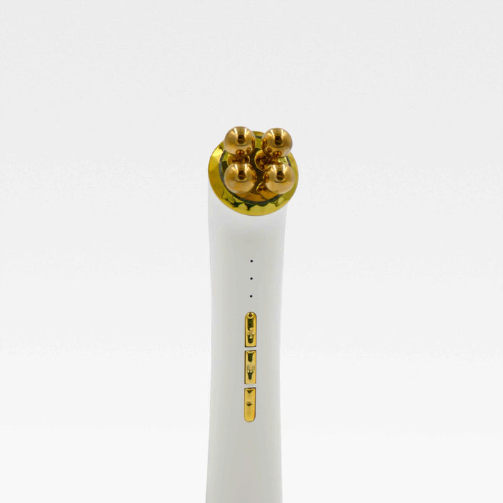 Tthe 3-in-1 Luxe Microcurrent Under Eye Massager.