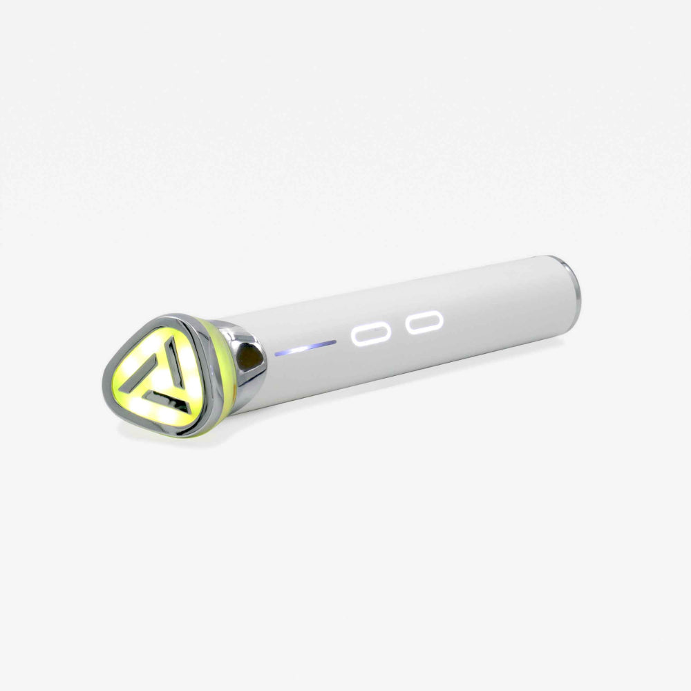 An elegant white and yellow electronic beauty wand adorned with a vibrant yellow triangle, showcasing contemporary design and sophistication.