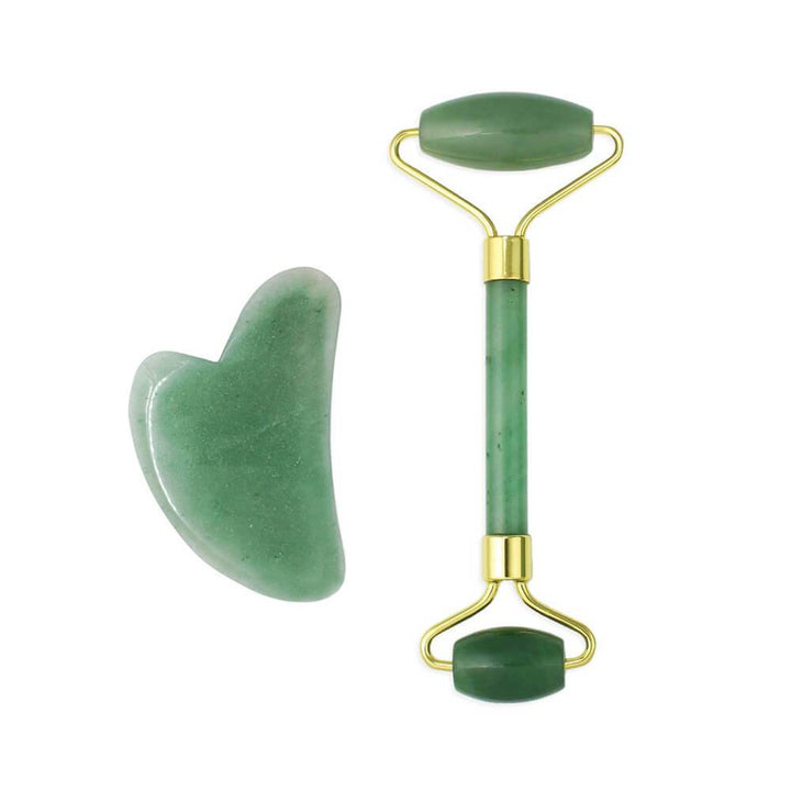 A jade roller and a gua sha tool
