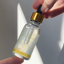 Load image into Gallery viewer, Femvy 24K Gold Anti-Ageing Serum texture close up