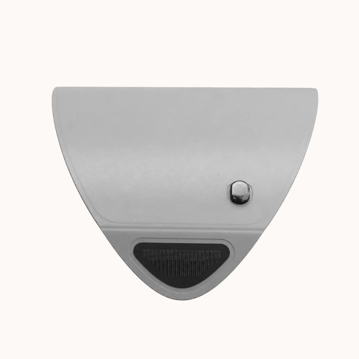 Close-up of the Goomi PDT LED Light Therapy Pod showing the side control button aand details. 