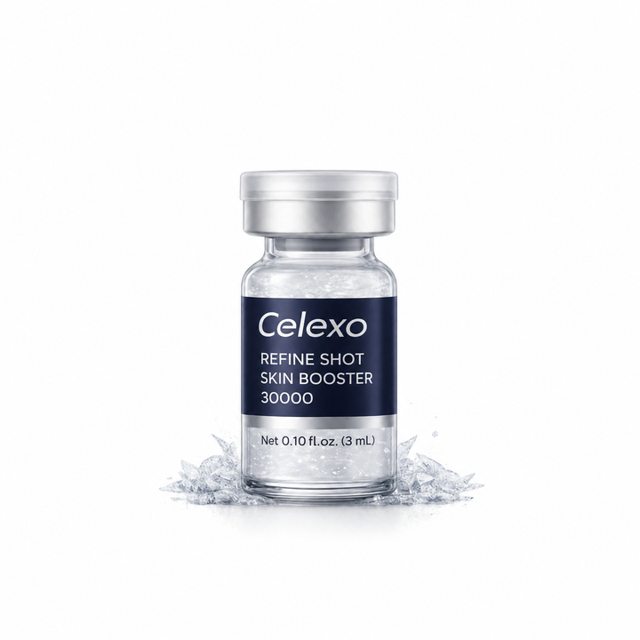 Front view of with Celexo Refine Shot Skin Booster 30000 vial, with a dark navy label and silver cap, displayed on a white background with decorative ice crystals at its base.