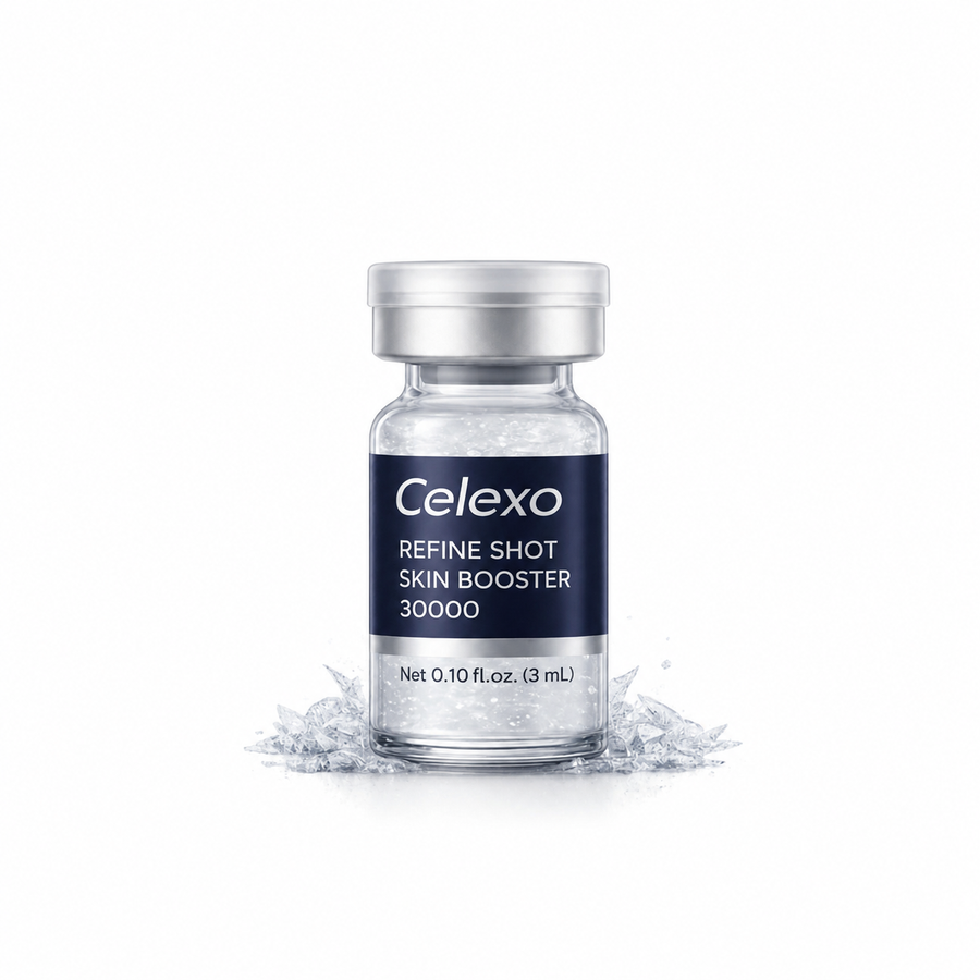 Front view of with Celexo Refine Shot Skin Booster 30000 vial, with a dark navy label and silver cap, displayed on a white background with decorative ice crystals at its base.