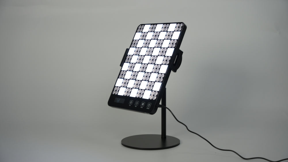  LED facial treatment lamp featuring a grid of lights for enhanced skincare and rejuvenation.