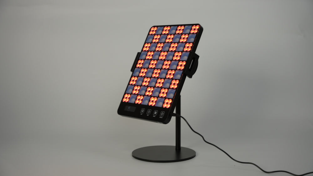 A striking red and orange screen, representing the LED Facial Treatment Lamp technology.