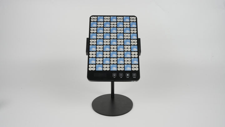 LED Facial Treatment Lamp on a black and white screen, showcasing a pattern of blue squares for aesthetic purposes.