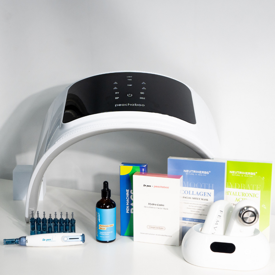 Professional bundle kit to use at-home beautifully arranged on a white surface, showcasing the Peachaboo LED Light Therapy Pod, Dr. Pen A9 microneedling device with cartridges, Peachaboo Hyaluronic Acid Serum, Peachaboo x Dr. Pen Hydra Calm Biocellulose Facial Mask, Neutriherbs Collagen and 4D Hyaluronic Acid sheet masks, and FEMVY RF skin tightening device. A complete professional skincare set designed to rejuvenate, hydrate, and enhance the skin’s natural glow.
