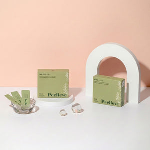 Medisco Peelieve Cica Cream boxes and pouches for professional post-treatment skincare against a peach background