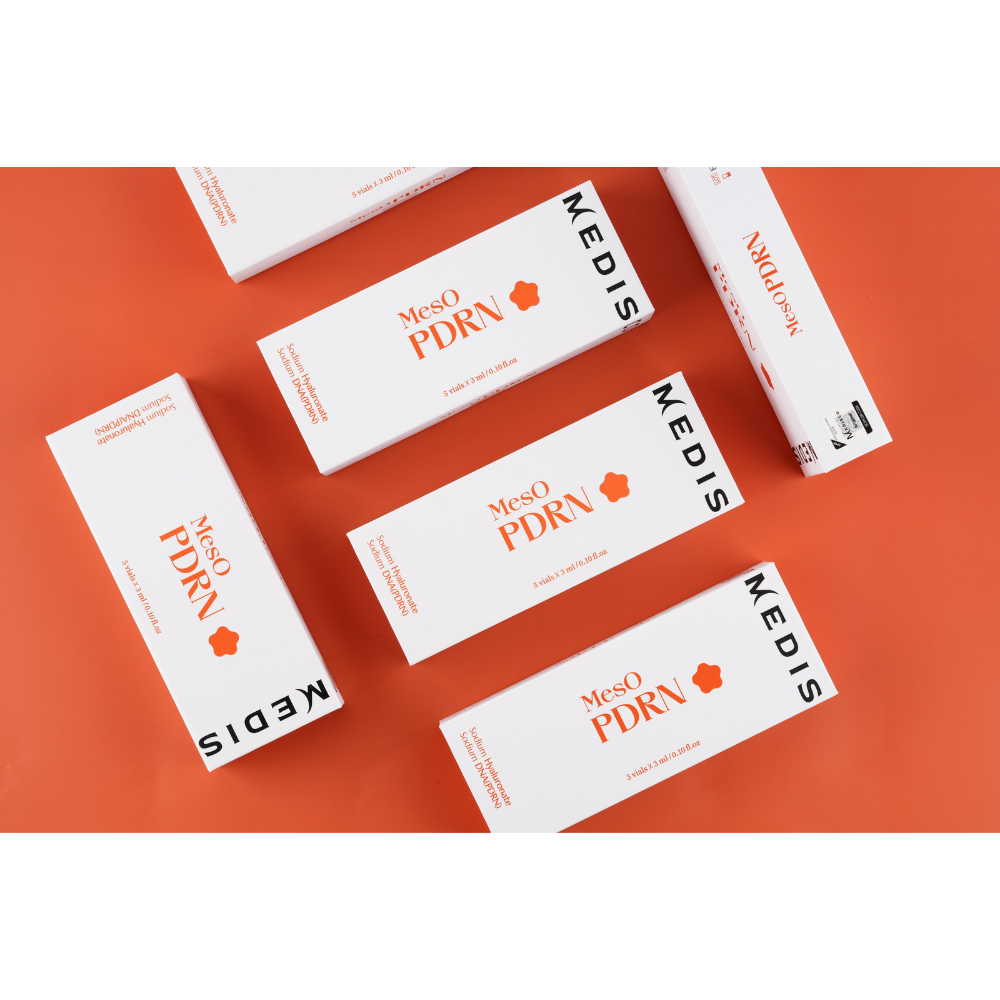 Medisco MesO PDRN Ampoule packaging boxes displayed on a bright orange background.
