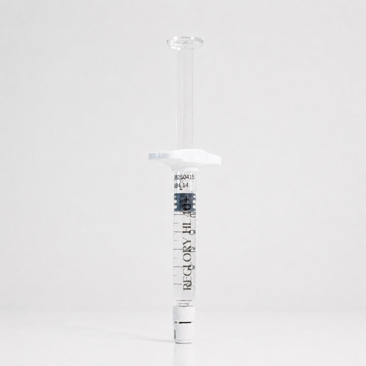 Reglory HL 40+ Hyaluronic Acid Skin Booster syringe standing upright on white background