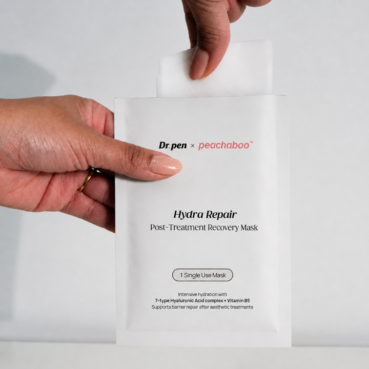 Removing mask sheet from a pack of Peachaboo Hydra Repair Biocellulose Post-Treatment Recovery Mask