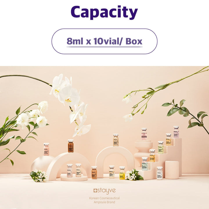 Display of small bottles with flowers on a light pink background, featuring the brand 'stayve'