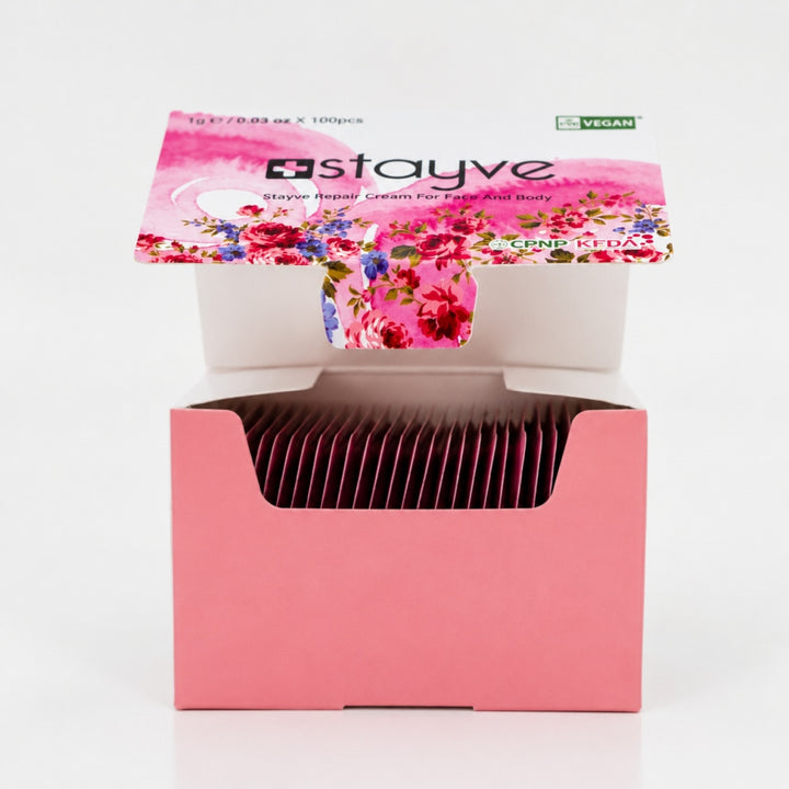 Open Stayve Repair Cream box showing individual sachets for face and body skincare