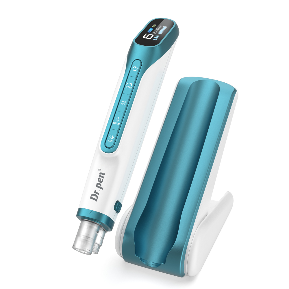 Dr. Pen H6 wireless microneedling pen with LCD display standing beside its teal and white charging dock.