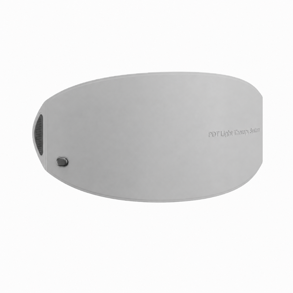 Goomi PDT LED Light Therapy Pod in light grey, angled side view showing curved flexible body and control details.