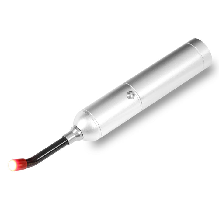 Handheld multi-wavelength red light therapy torch with illuminated flexible treatment tip on white background.