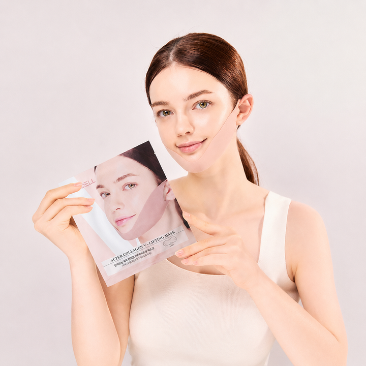 Woman wearing the Super Collagen V Lifting Mask while holding the product packaging in a bright skincare studio setting.