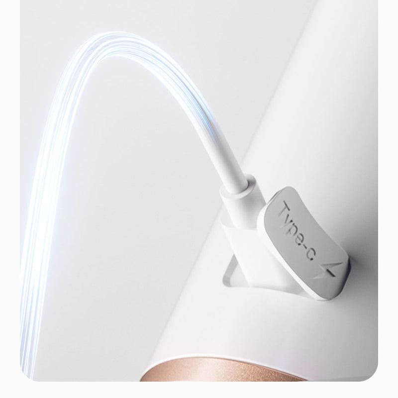 Close-up of the Type-C charging cable connector for the Hydro-Thermal Pore Cleanser, with a glowing charging effect.