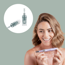 Load image into Gallery viewer, a woman holding zobelle maxima microneedling pen with 36 pin cartridge